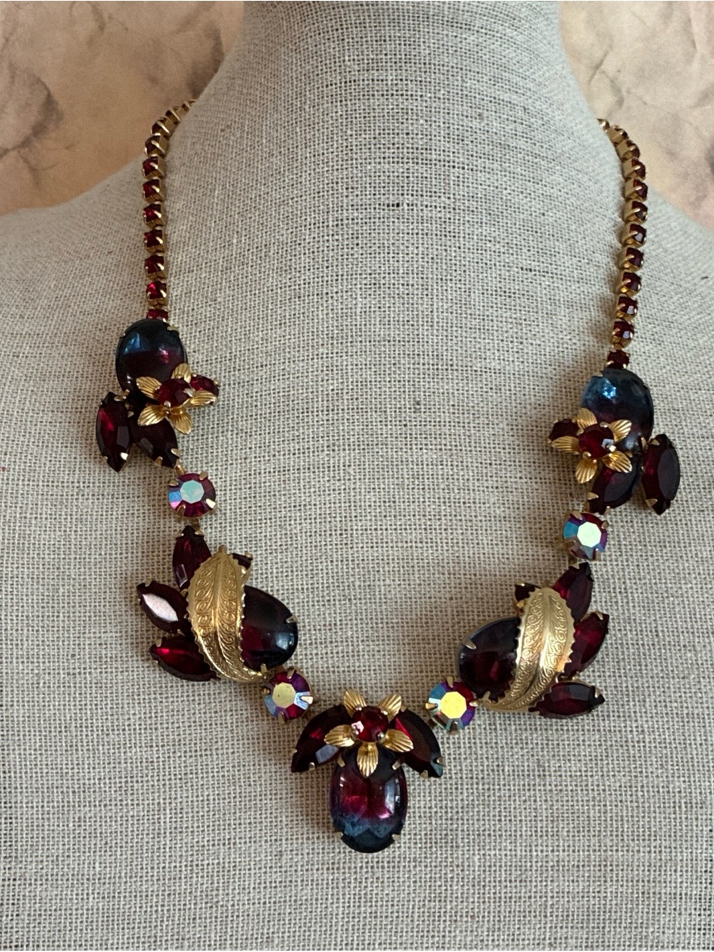 Weiss Book Piece necklace with blue and cranberry heliotrope cabochons